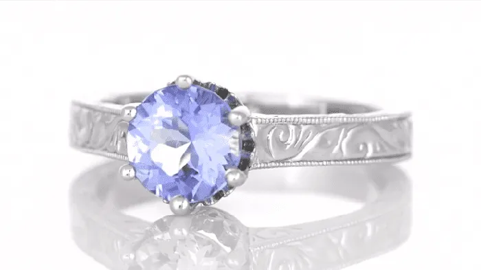 Antique Jewelry Mall Art Deco Carved Filigree Scrolls Crown Tanzanite Solitaire Engagement Ring in 18 Karat White Gold Rings Antique Jewelry Mall Art Deco Carved Filigree Scrolls Crown Tanzanite Solitaire Engagement Ring in 18 Karat White Gold Rings